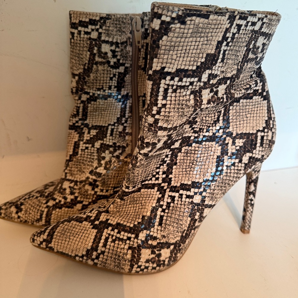 Express Snakeskin Heel half boots size 8